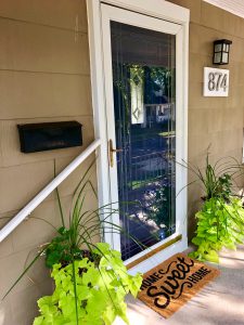 Front door with 874 West Address